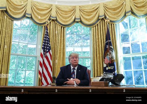 Donald Trump At His Desk In Oval Office High Resolution Stock ...