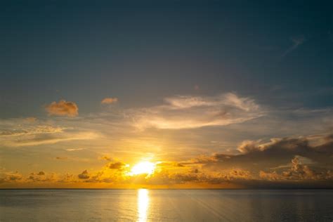 Premium Photo | Sea beach with sky sunset or sunrise clouds over the ...