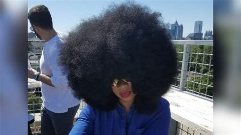 Woman holds record for world’s largest afro for the 4th time