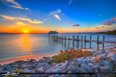 Stuart Florida Sunset Pier along Rocky Coast | Royal Stock Photo