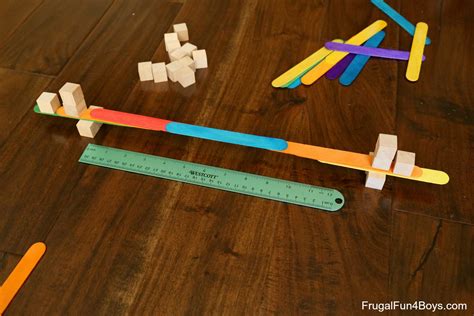 Bridge Building STEM Challenge with Craft Sticks and Wooden Cubes ...