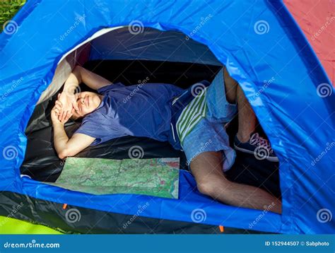 Young Man in the Tent stock image. Image of grass, male - 152944507