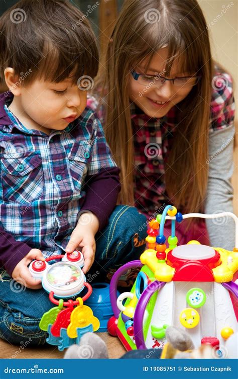 Children Sharing Toys Stock Images - Download 153 Royalty Free Photos