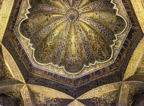 This is the ceiling of the Alcazar in Sevilla, which features clear Islamic influence. The ...