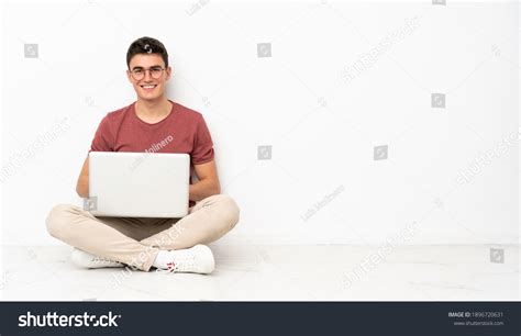 23,897 Man sitting on floor laptop Images, Stock Photos & Vectors ...