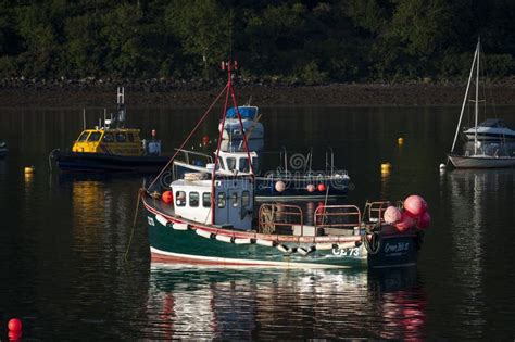 Boats in the Harbour of the Town of Portree in the Island of Skye in Scotland, United Kingdom ...