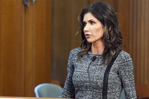 South Dakota's Noem defends forgoing masks as virus surges