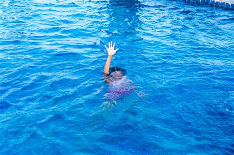 Children Drowning In Swimming Pool Stock Photo - Download Image Now - iStock