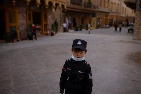 WIDER IMAGE In China's new Xinjiang: patriotic tourism, riot police and ...