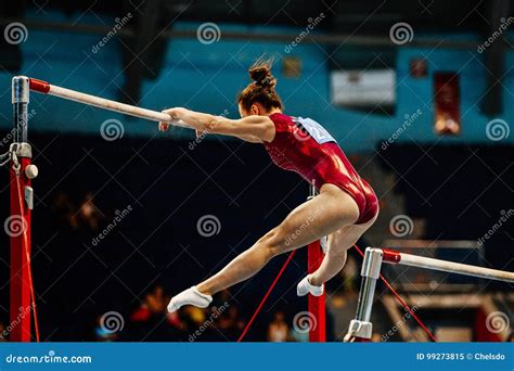 Uneven bars female gymnast editorial image. Image of floor - 99273815