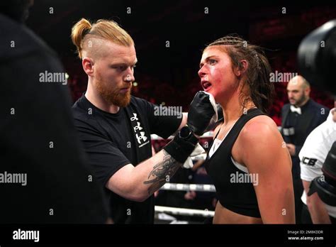 Faith Ordway reacts after the referee stops the super-lightweight bout ...