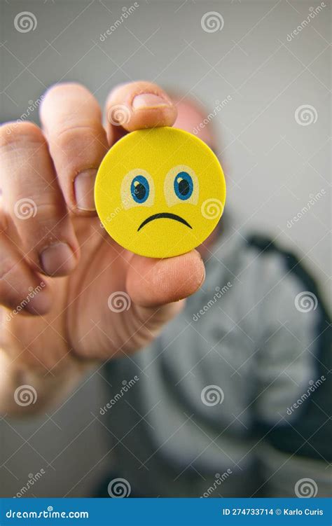 Hiding Behind Yellow Emoji Face Stock Photo - Image of happy, emoticon: 274733714