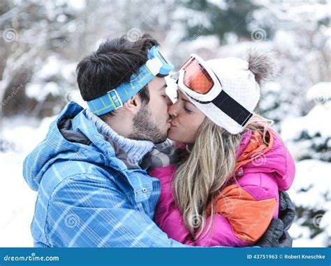 Couple Kissing In Winter On Ski Stock Image - Image: 43751963