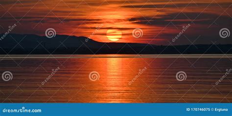 Golden Sunset Over Water, Rare and Spectacular Sunset Over the Sea, Beautiful Colors in the Sky ...