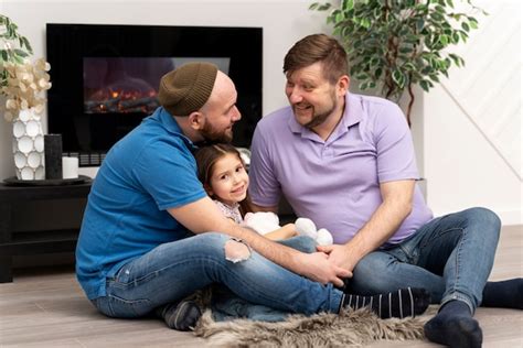 Free Photo | Happy family of two dads and a baby