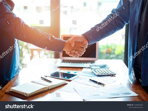 Successful Businessmen Shaking Hands After Discussing Stock Photo ...