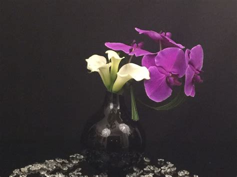 Small black vase with white mini callas and phaleonapsis | Black vase ...