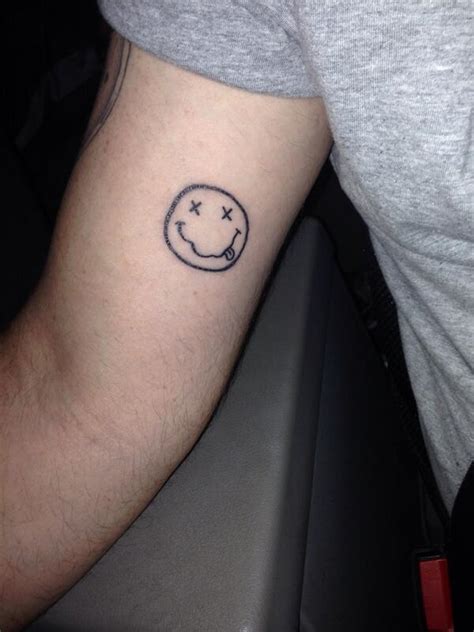 Nirvana Smiley Face Tattoo