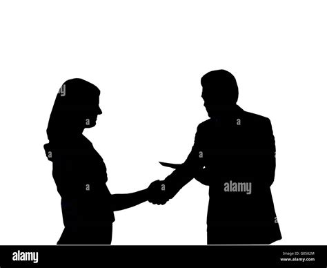 Silhouette of the man shaking hand to young woman Stock Photo - Alamy