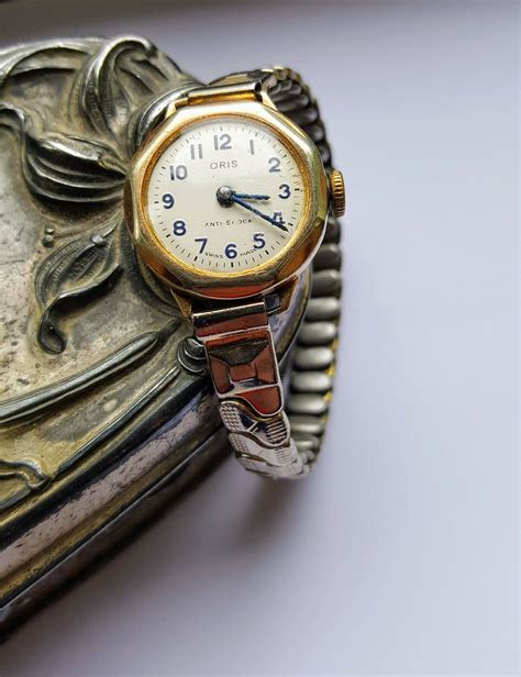 Ladies vintage Oris mechanical wind up watch, gold coloured wrist watch, analogue stretch strap ...