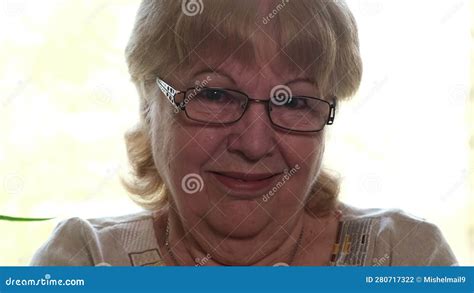 Face Portrait of Pretty Old Woman in Glasses Smiling Looking at Camera ...