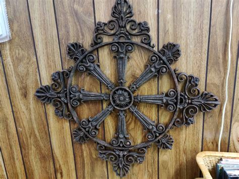 Lot # 31 ornate cast-iron wall decorations decor 29 in wide - Rolphs Auction Depot