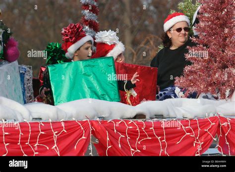 Family riding on a Christmas parade float. Editorial-use only Stock ...