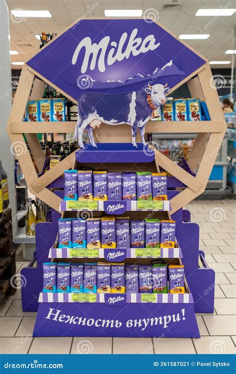 Milka Brand Stand with Logo and Milka Brand Symbol - a Cow. Selling ...