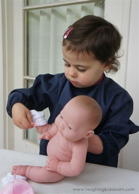 Caring for newborn with pretend play - Laughing Kids Learn