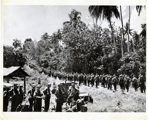 U.S. troops marching on Mindanao Island, Philippines, 1945 | The Digital Collections of the ...