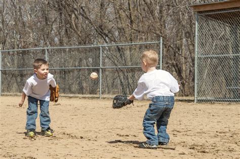 Boys playing catch stock photo. Image of practicing, practice - 39002786