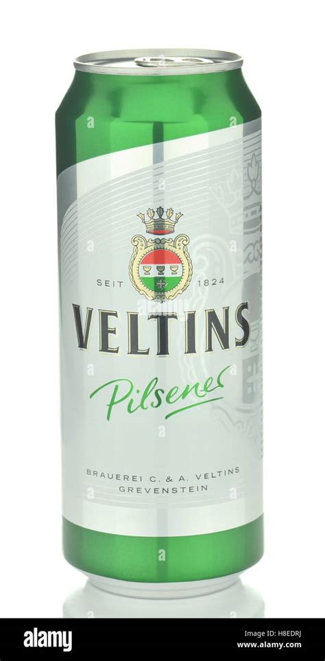 Veltins pilsener beer isolated on white background. Veltins pilsener is brewed in Brauerei C and ...