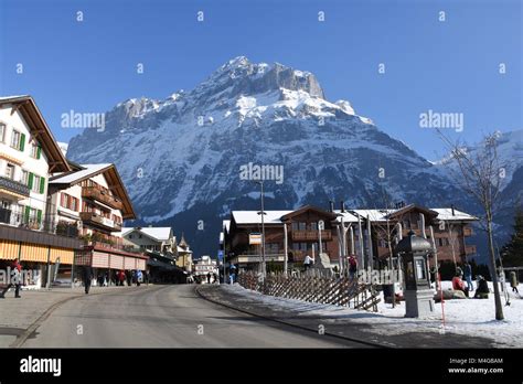 Alpine village Grindelwald, Switzerland, and Mättenberg in the background Stock Photo - Alamy