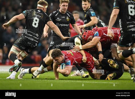 Kieran Hardy of Scarlets goes over for a tryduring the United Rugby ...