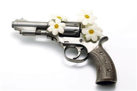 Premium AI Image | a gun with flowers on it