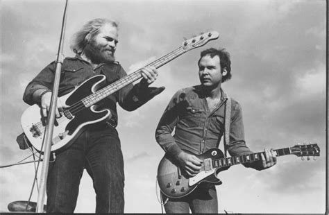 A young Dusty Hill and Billy Gibbons of ZZ Top playing a live show. Description from ...