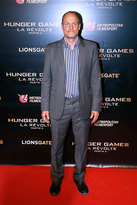 Here's Why Woody Harrelson Wore Pajamas to the "Hunger Games" Premiere | GQ