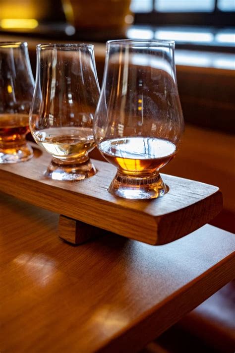 Flight of Single Malt Scotch Whisky in Glasses Served in Whiskey Bar in ...