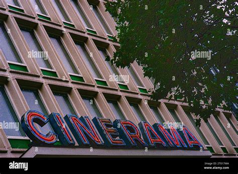 Vintage and retro facade with entrance and name sign of cinema and theater Cinerama. Rotterdam ...