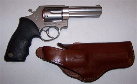 Taurus Model 65 Stainless 357 4 Inch W/Holster For Sale at GunAuction.com - 8435299