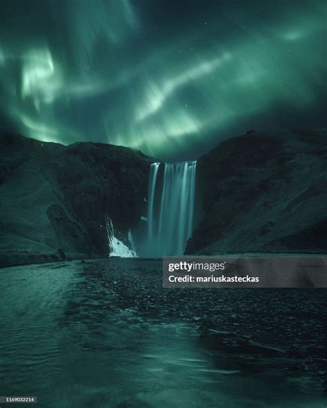 Northern Lights Over Skogafoss Waterfall Iceland High-Res Stock Photo ...