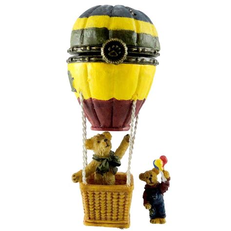 two teddy bears in a hot air balloon