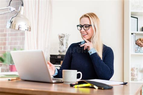 Happy Woman Looking at Laptop Stock Image - Image of entrepreneur, learning: 127776449