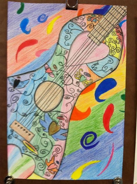 a drawing of a guitar on a piece of paper