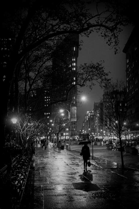 ~Top photo~ A rainy night in New York City at the Flat Iron Building and Madison Square Park ...