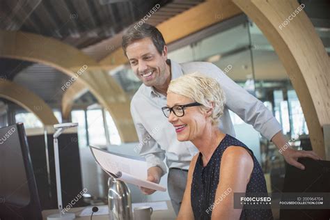 Business people talking in office — Focus On Foreground, cooperation - Stock Photo | #200964704