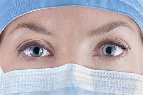 Female Surgeon Wearing Surgical Mask Photograph by Science Photo ...