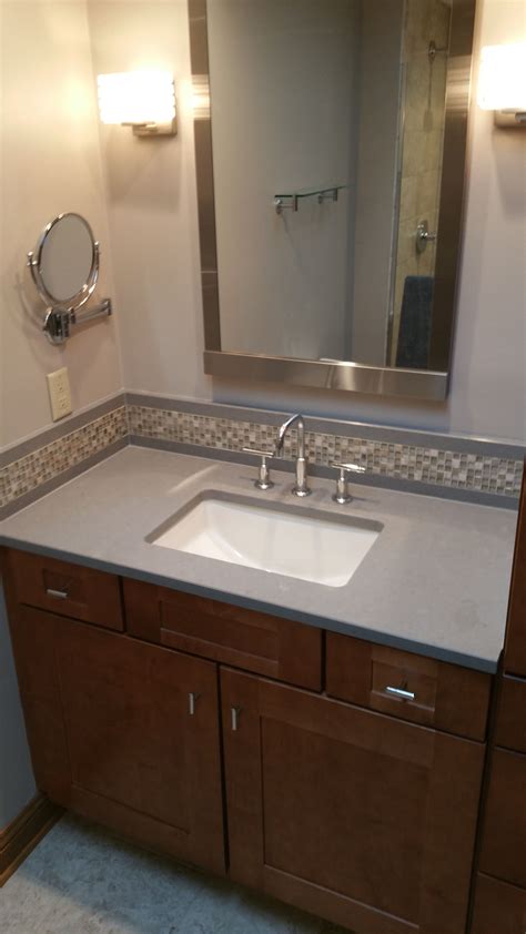 Backsplash-mosaic glass tile with Caesarstone wrap to match vanity top ...