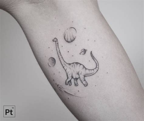 dinosaur, planet, arm tattoo, tattoo for all Subtle Tattoos, Trendy ...