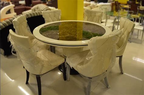 Cream 6 Seater Round Dining Table at best price in Kochi | ID: 19976308973